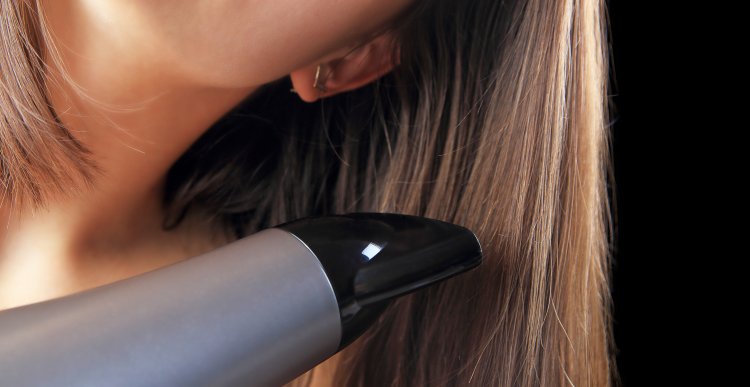 woman drying hair hair dryers